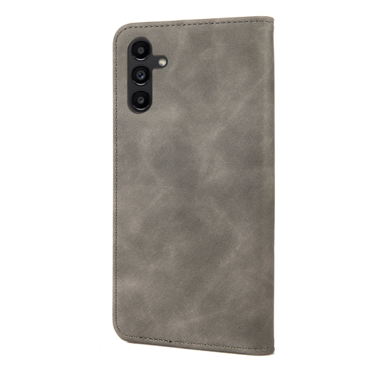 Grey splicing leather phone case for Samsung Galaxy A05s, featuring a wallet design with card slots and a stand function.